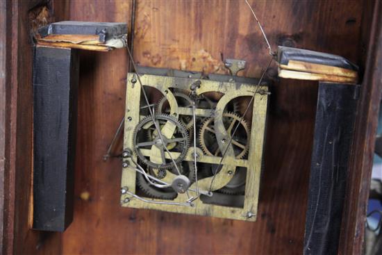 A Black Forest carved cuckoo clock 35in.